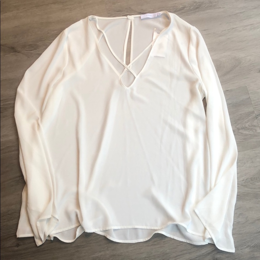 Sheer white blouse from Lush